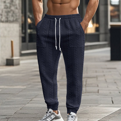 Men's sweatpants with textured pattern and practical pockets Skorter