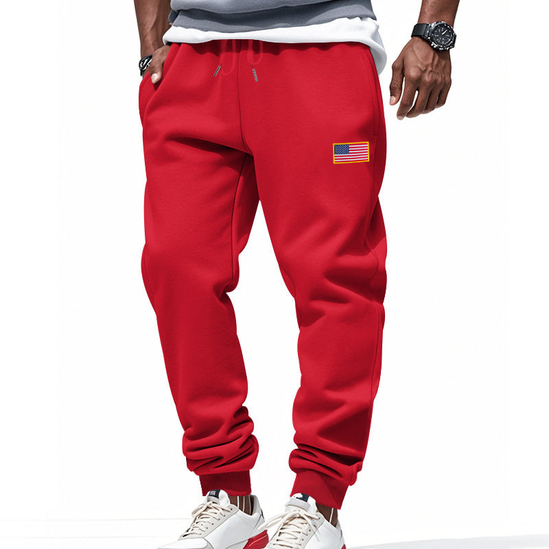 Men's sporty sweatpants with elastic waistband and practical side pockets Skorter
