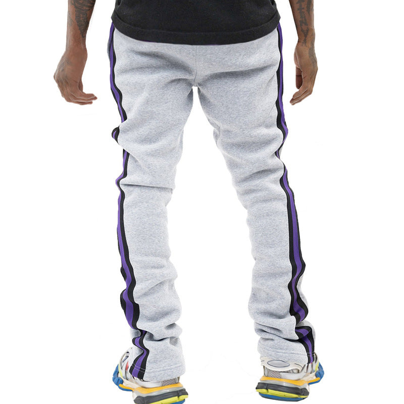 Men's sporty sweatpants with side stripes and adjustable waistband Skorter