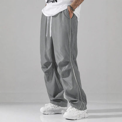 Men's sporty leisure trousers with side contrast stripes and adjustable waistband Skorter