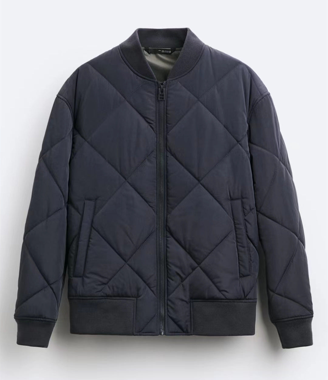 Men's quilted casual jacket with sporty cut and side pockets Skorter