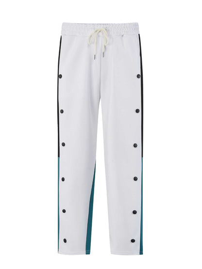 Men's sporty training pants with side snap buttons and elastic waistband Skorter