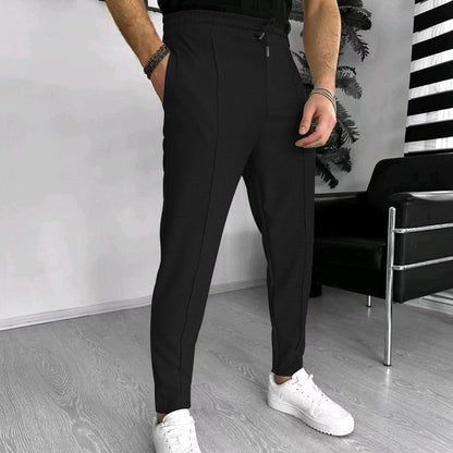 Men's stylish high-waisted pants with elastic drawstring and textured design Skorter