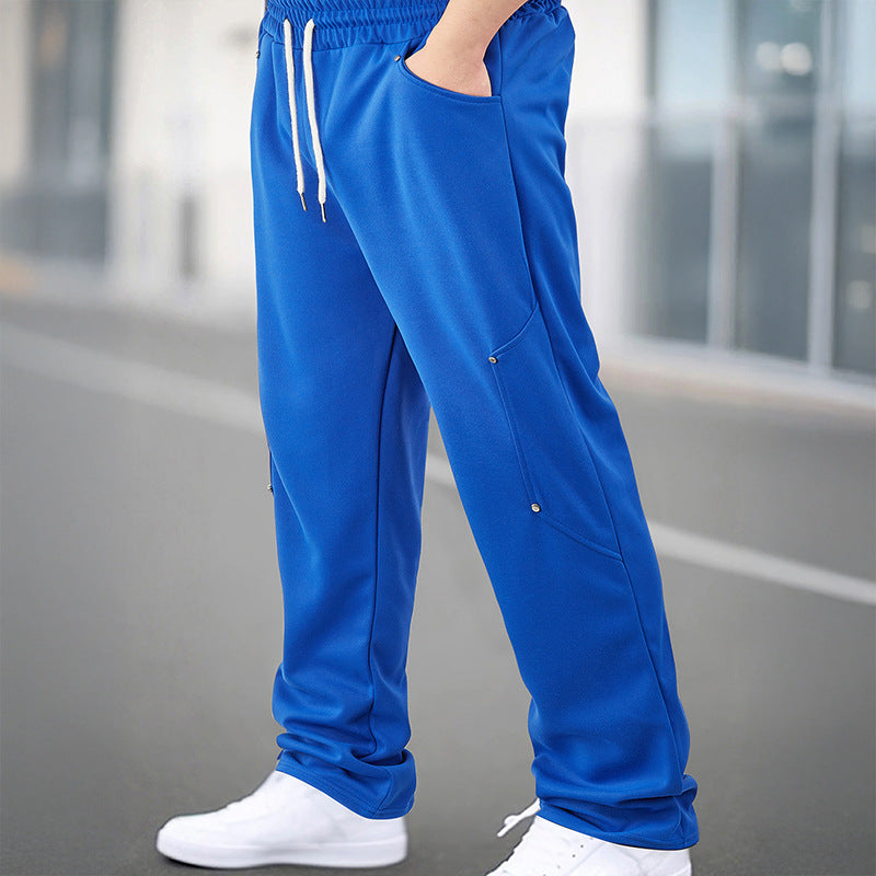 Men's sporty jogging pants with breathable mesh inserts and elastic waistband Skorter