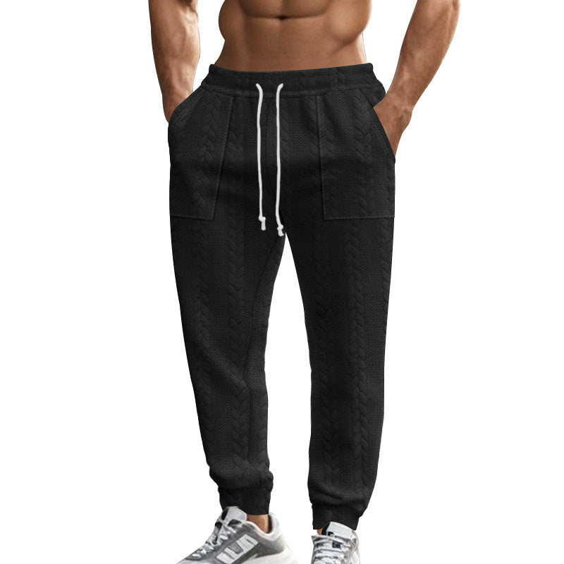 Men's sweatpants with textured pattern and practical pockets Skorter