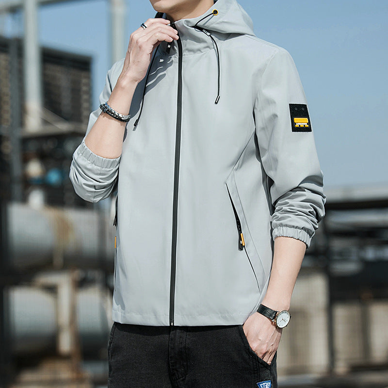 Men's sporty windbreaker with practical zipper and adjustable hood Skorter