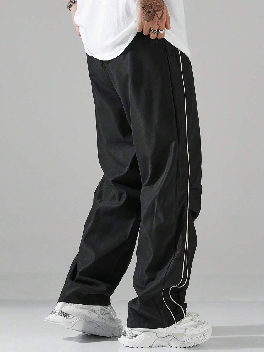 Men's sporty leisure trousers with side contrast stripes and adjustable waistband Skorter