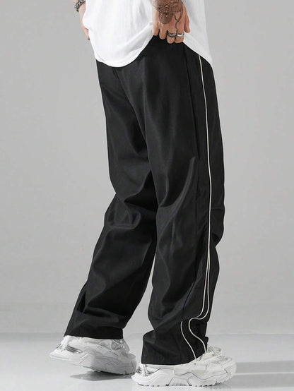 Men's sporty leisure trousers with side contrast stripes and adjustable waistband Skorter