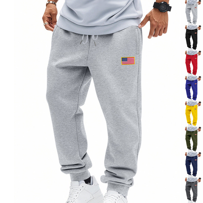 Men's sporty sweatpants with elastic waistband and practical side pockets Skorter