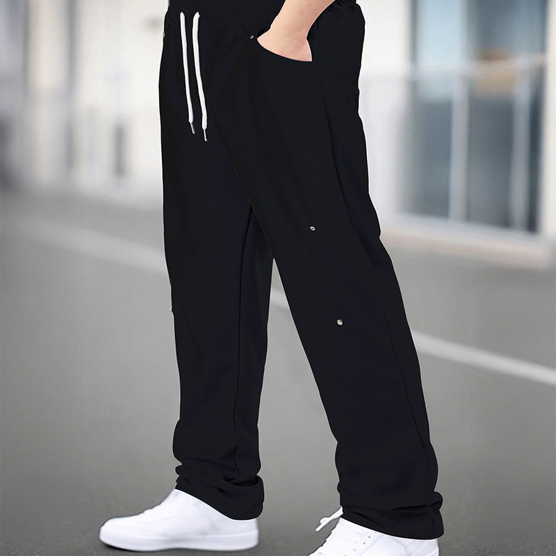 Men's sporty jogging pants with breathable mesh inserts and elastic waistband Skorter