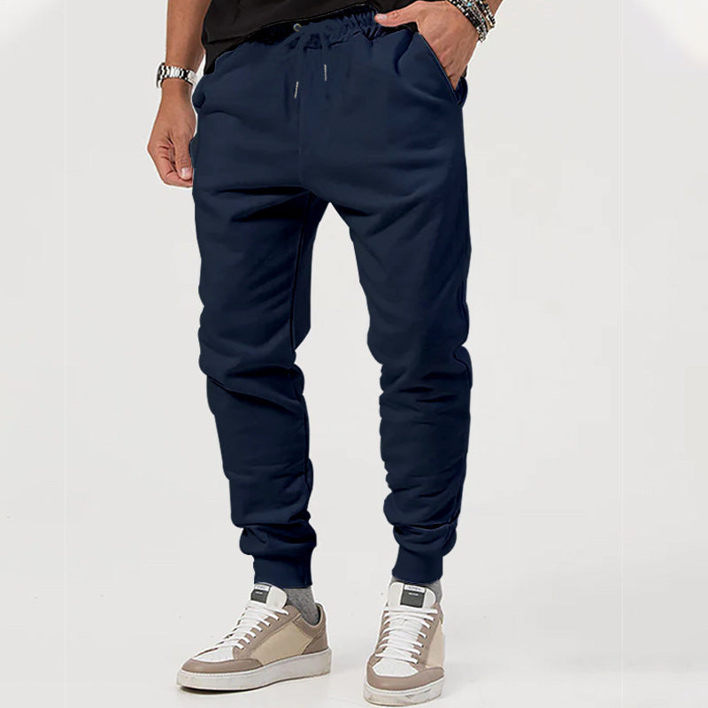 Men's sporty jogging pants with adjustable drawstring and elastic cuffs Skorter