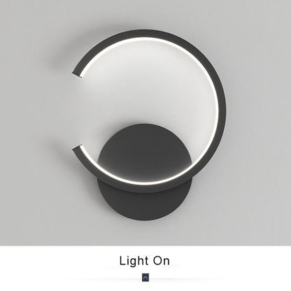 Skorter | Minimalist round LED wall lamp with arm, 1 light