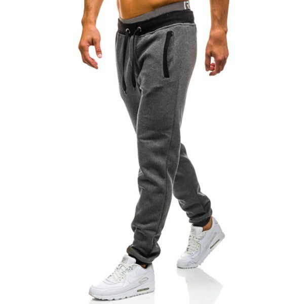 Men's sporty sweatpants with elastic waistband and side pockets Skorter