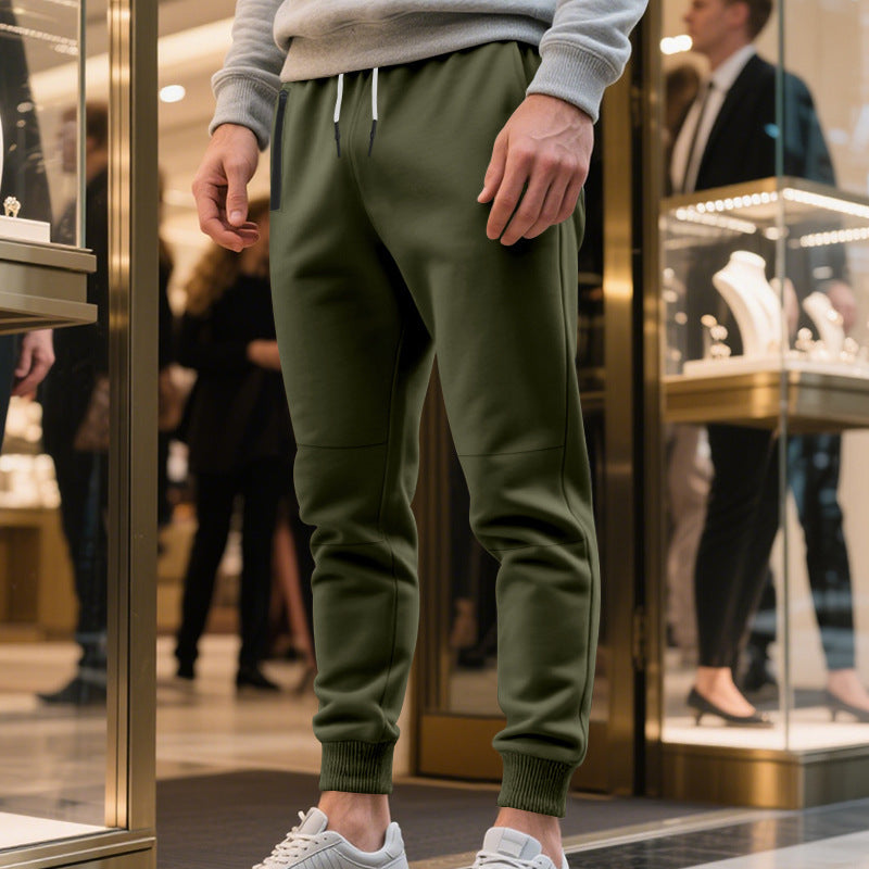 Men's sporty jogging pants with elastic waistband and practical pockets Skorter