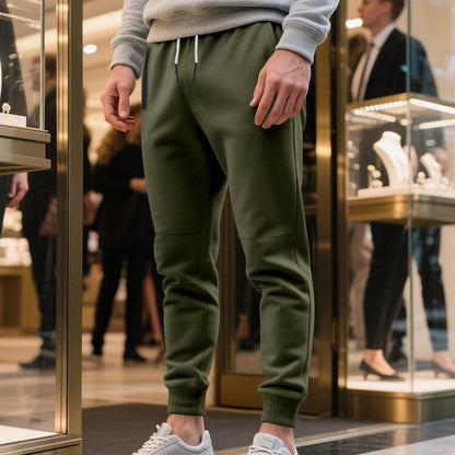 Men's sporty jogging pants with elastic waistband and practical pockets Skorter