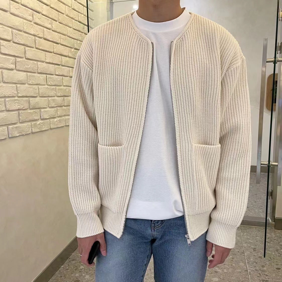 Men's chunky knit jacket with voluminous sleeves and stand-up collar Skorter