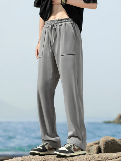 Men's sporty leisure pants with side pockets and elastic waistband Skorter