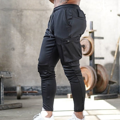 Herrjoggingbyxor med cargo, praktiska dragkedjefickor och modernt skurna skorterbyxor