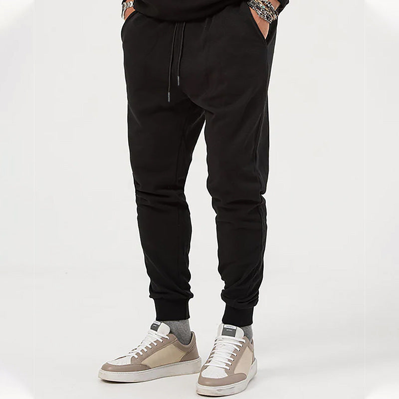 Men's sporty jogging pants with adjustable drawstring and elastic cuffs Skorter