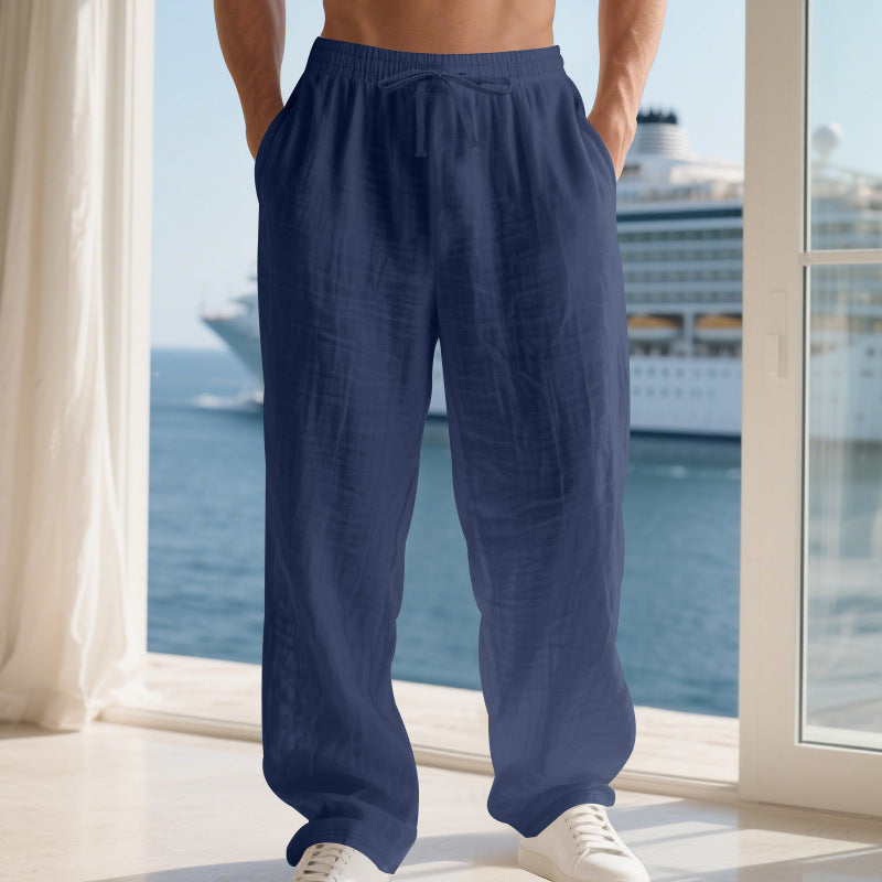 Men's relaxed linen trousers with elastic waistband and loose fit Skorter