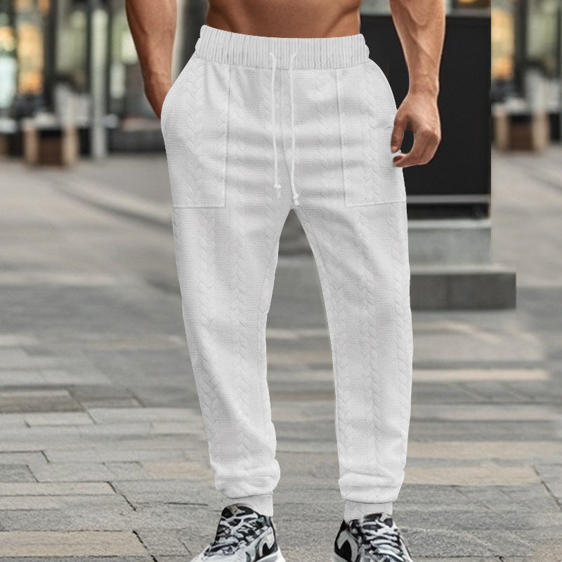 Men's sporty joggers with textured design and elastic waistband Skorter