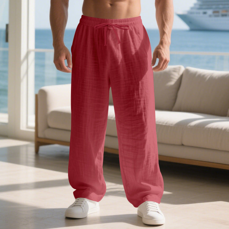 Men's relaxed linen trousers with elastic waistband and loose fit Skorter
