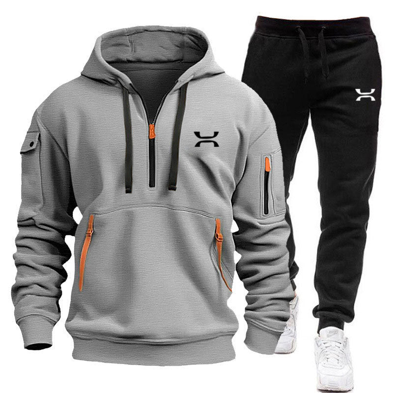 Men's sporty hoodie and tracksuit set with functional pockets and sporty cut Skorter