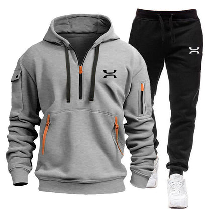 Men's sporty hoodie and tracksuit set with functional pockets and sporty cut Skorter