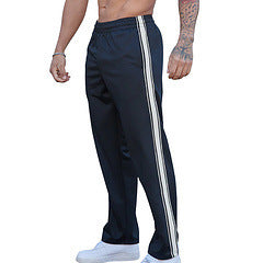 Men's sporty training pants with side stripes Skorter