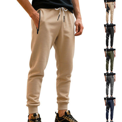 Men's sporty jogging pants with elastic waistband and practical pockets Skorter