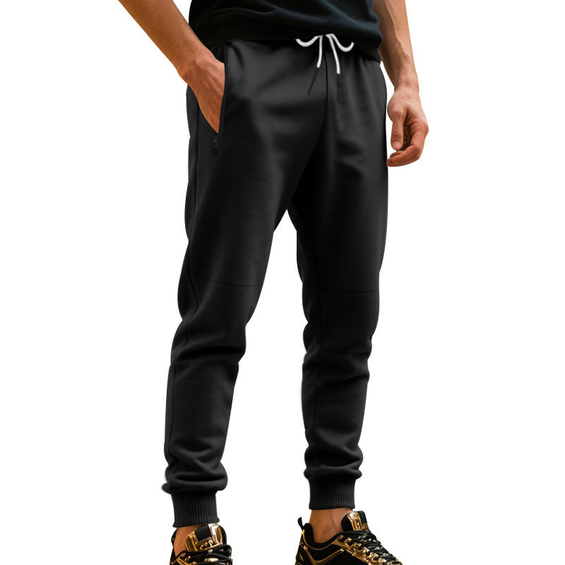 Men's sporty jogging pants with elastic waistband and practical pockets Skorter