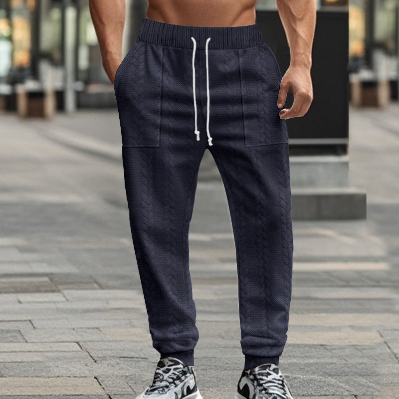 Men's sporty joggers with textured design and elastic waistband Skorter