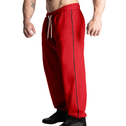 Men's sporty jogging pants with adjustable waistband and side pockets Skorter