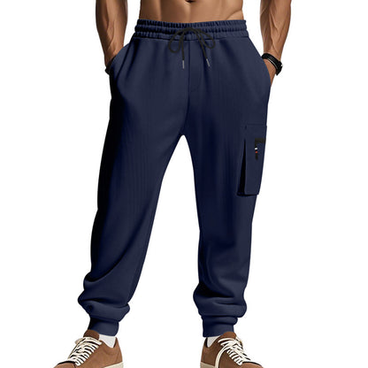 Men's sporty jogging trousers with practical side pockets and adjustable waistband Skorter