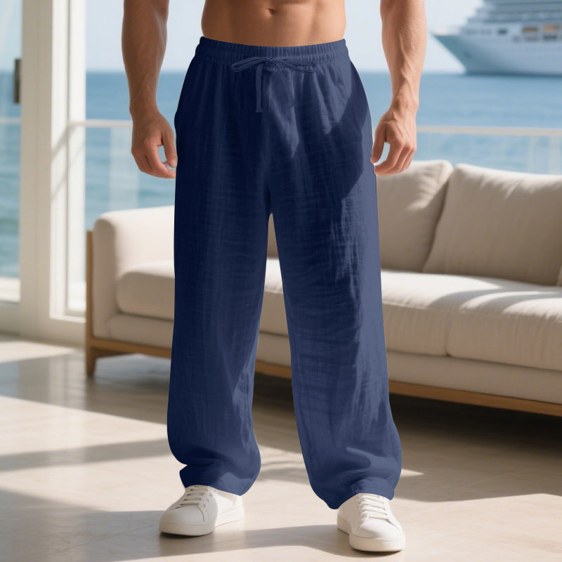 Men's relaxed linen trousers with elastic waistband and loose fit Skorter