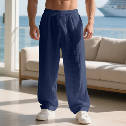 Men's relaxed linen trousers with elastic waistband and loose fit Skorter