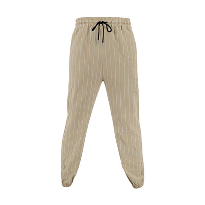 Men's elegant leisure pants with elastic waistband and side stripes Skorter