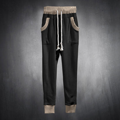 Men's sporty jogging pants with comfortable side pockets and elastic waistband Skorter