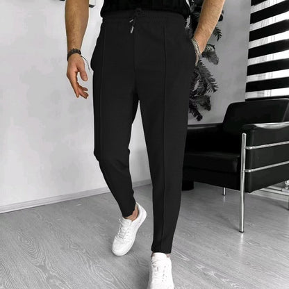 Men's stylish high-waisted pants with elastic drawstring and textured design Skorter