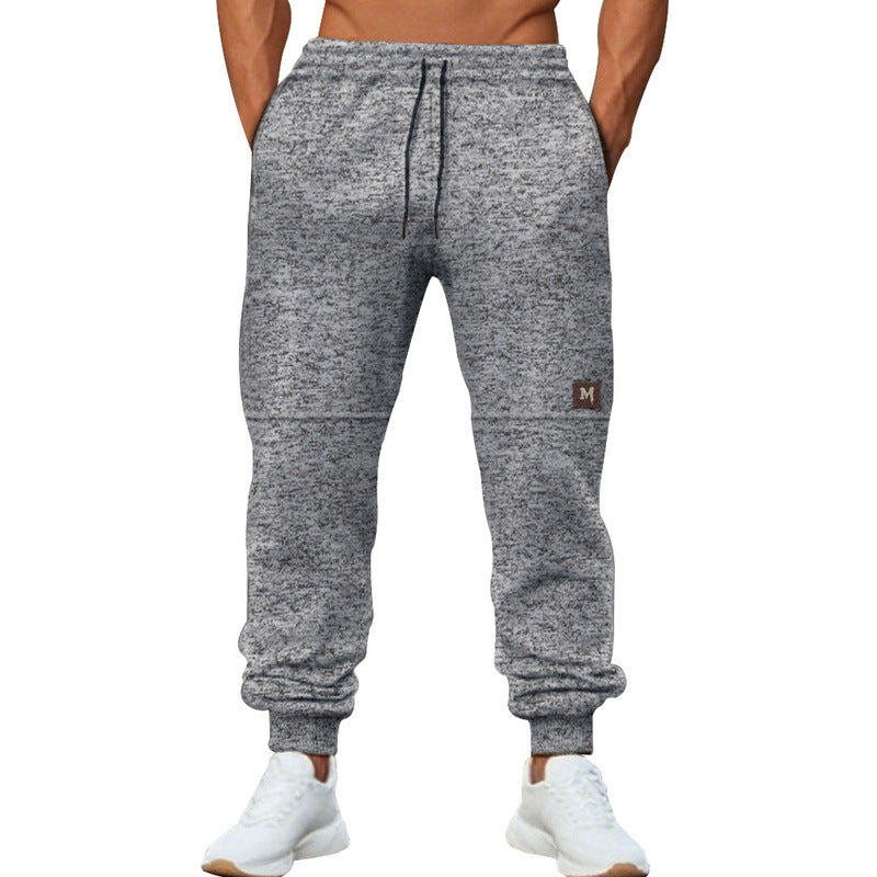 Men's sporty sweatpants with adjustable drawstring and pockets Skorter