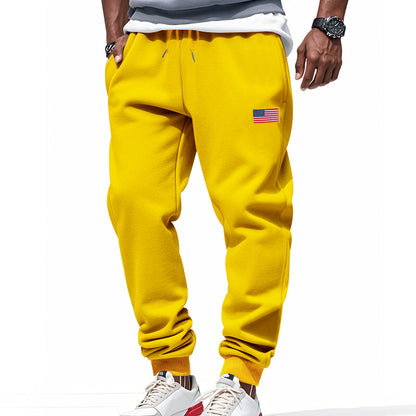 Men's sporty sweatpants with elastic waistband and practical side pockets Skorter