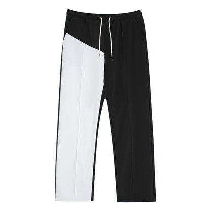 Men's sporty training pants with two contrasting color stripes Skorter