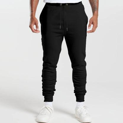 Men's sports sweatpants with striped elastic cuffs and practical side pockets Skorter