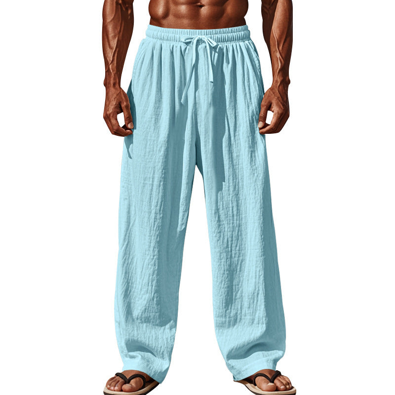 Men's airy beach pants with elastic waistband and practical side pockets Skorter