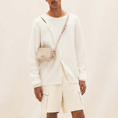 Men's stylish knitted sweater with asymmetrical cut and snap buttons Skorter