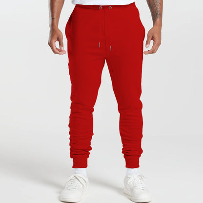 Men's sports sweatpants with striped elastic cuffs and practical side pockets Skorter