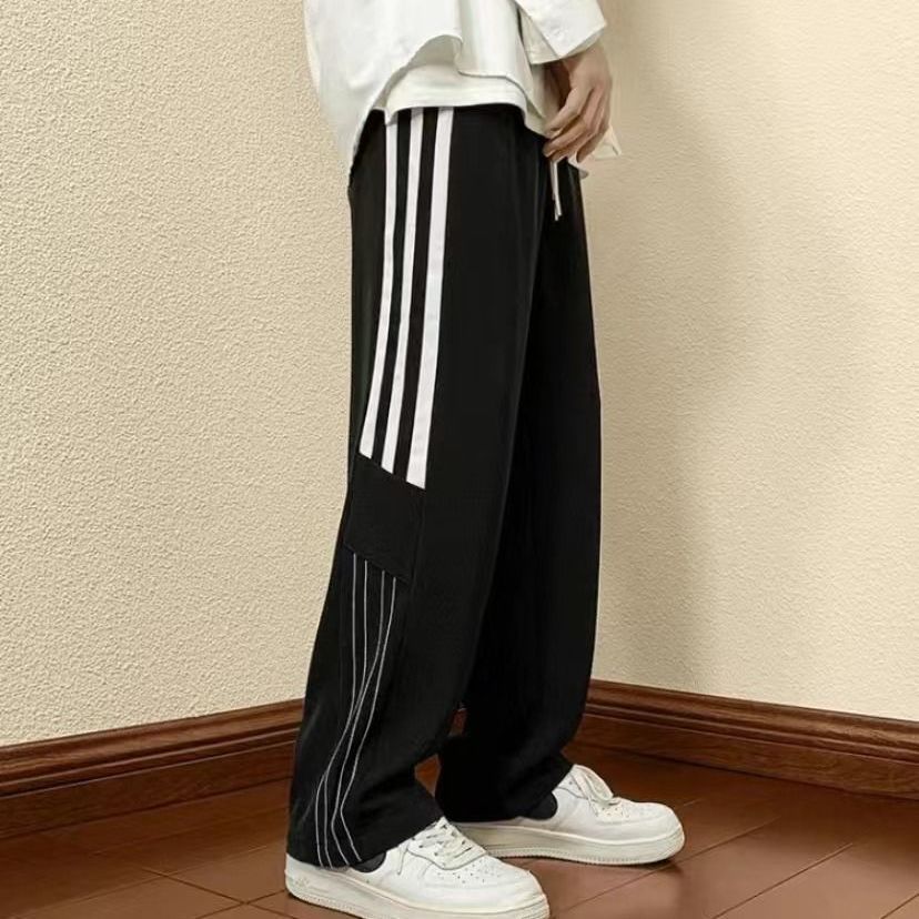 Men's sporty casual pants with modern side details Skorter