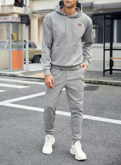 Men's tracksuit with textured design and practical details Skorter