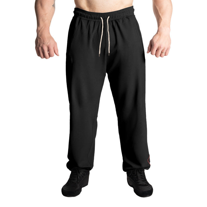 Men's sporty jogging pants with adjustable waistband and side pockets Skorter