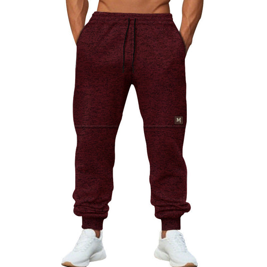 Men's sporty sweatpants with adjustable drawstring and pockets Skorter